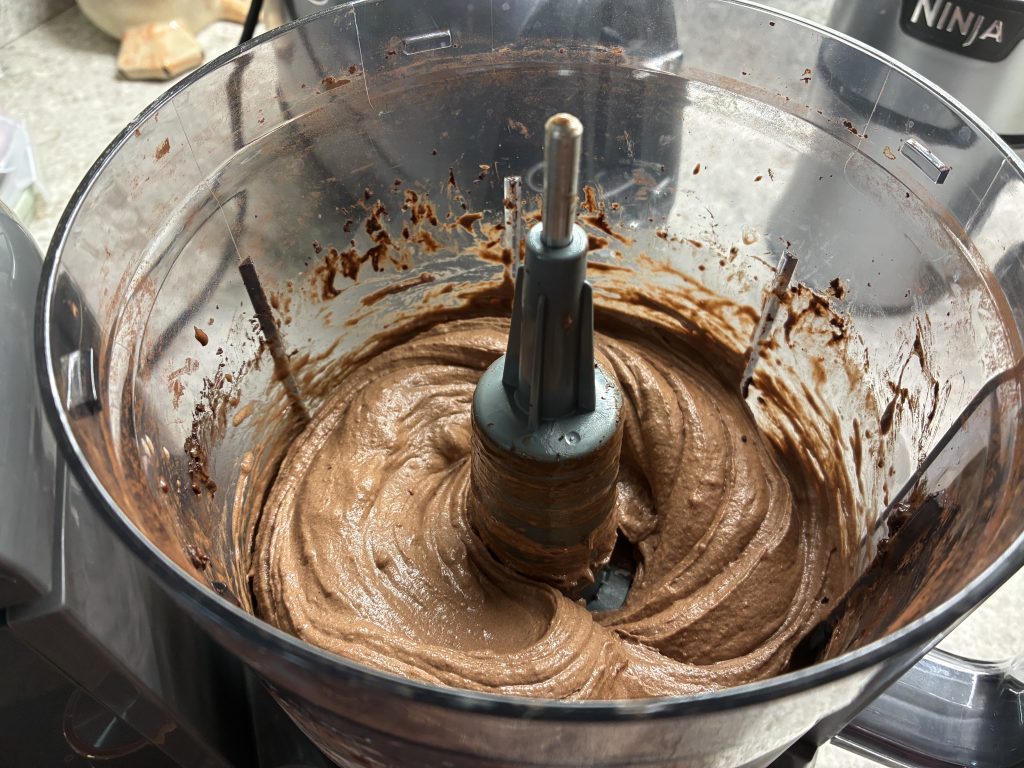 Blended nice cream in the food processor bowl